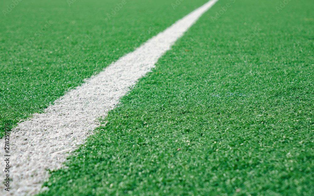 White Stripe Line at The Corner on Artificial Green Soccer Field