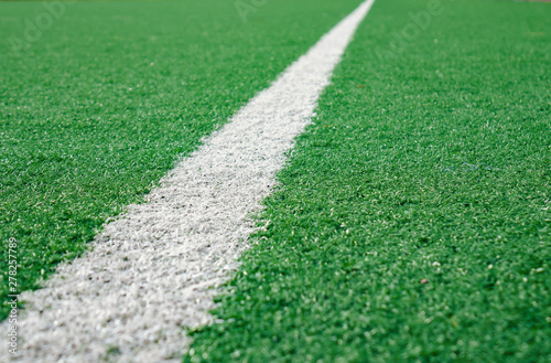 White Stripe Line at The Corner on Artificial Green Soccer Field