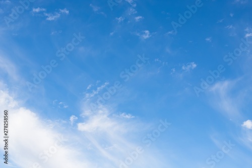 Light blue sky with cirrocumulus clouds. Beautiful sky background