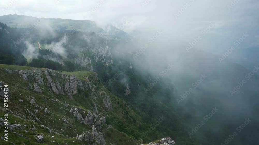 Fog slowly moves by mountain - (4K) Fog slowly moves by mountain - (4K)