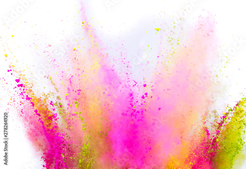 Colored powder explosion on white background. Freeze motion.