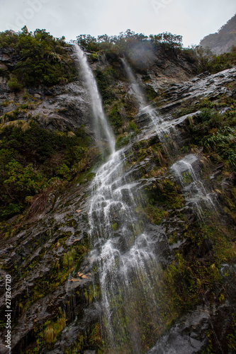 Waterfall at Milford sound. Fjordland. new Zealand. Fog. Misty