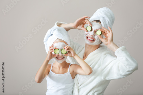 Little girl and mother with...