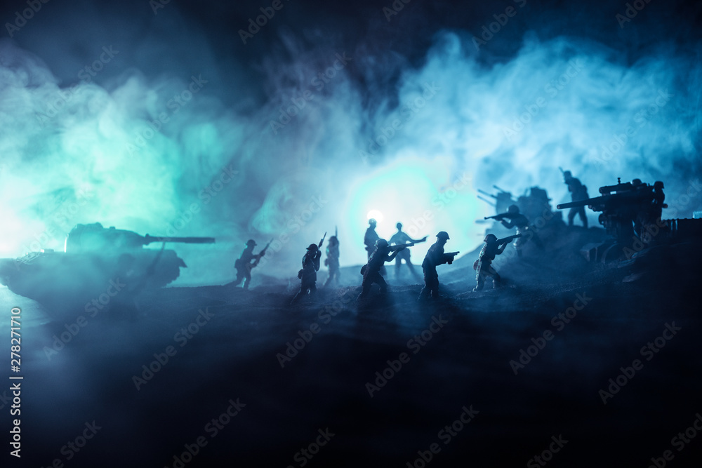 War Concept. Military silhouettes fighting scene on war fog sky background,