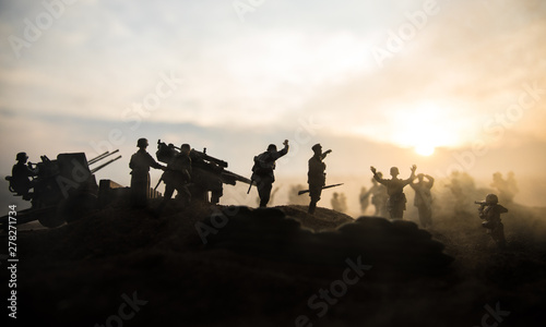 War Concept. Military silhouettes fighting scene on war fog sky background,