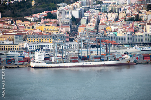 A container ship loading up in Lisbon, Portugal