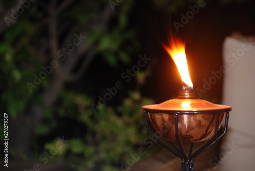 Outdoor Citronella Oil Lamp at Night