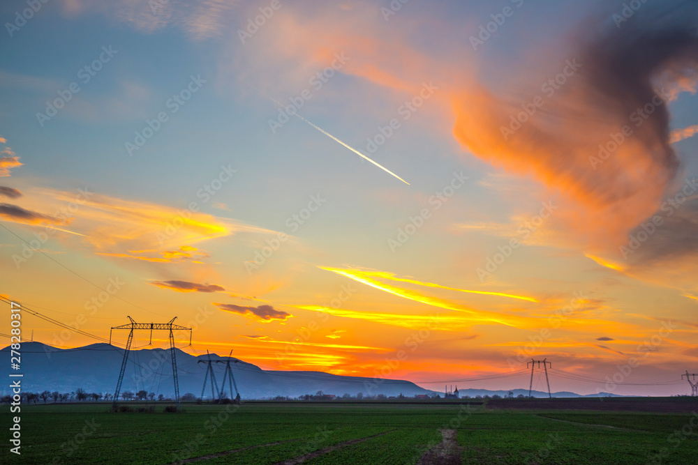 Obraz premium Clouds at the sunset