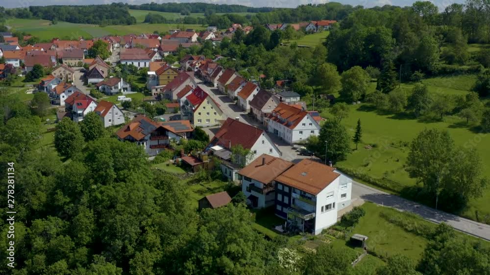 Aerial of Schopfloch in Germany. Ascending at the end of the village ...