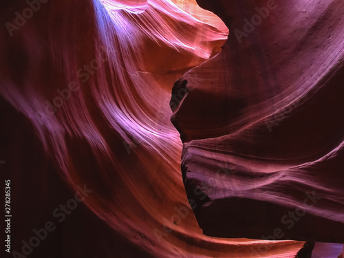 a purple colored rock wall in upper antelope canyon, az