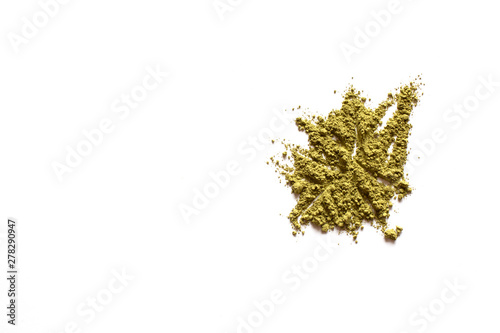 Matcha powder explosion on white background. Top view. Japanese Culture. Popular Healthy Tea.