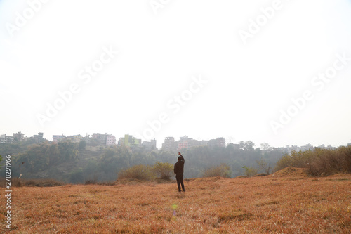 man in the field © jarupoom