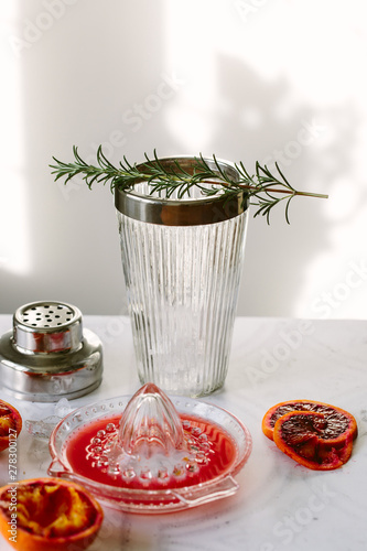 Blood oranges squeezed to make a cocktail.