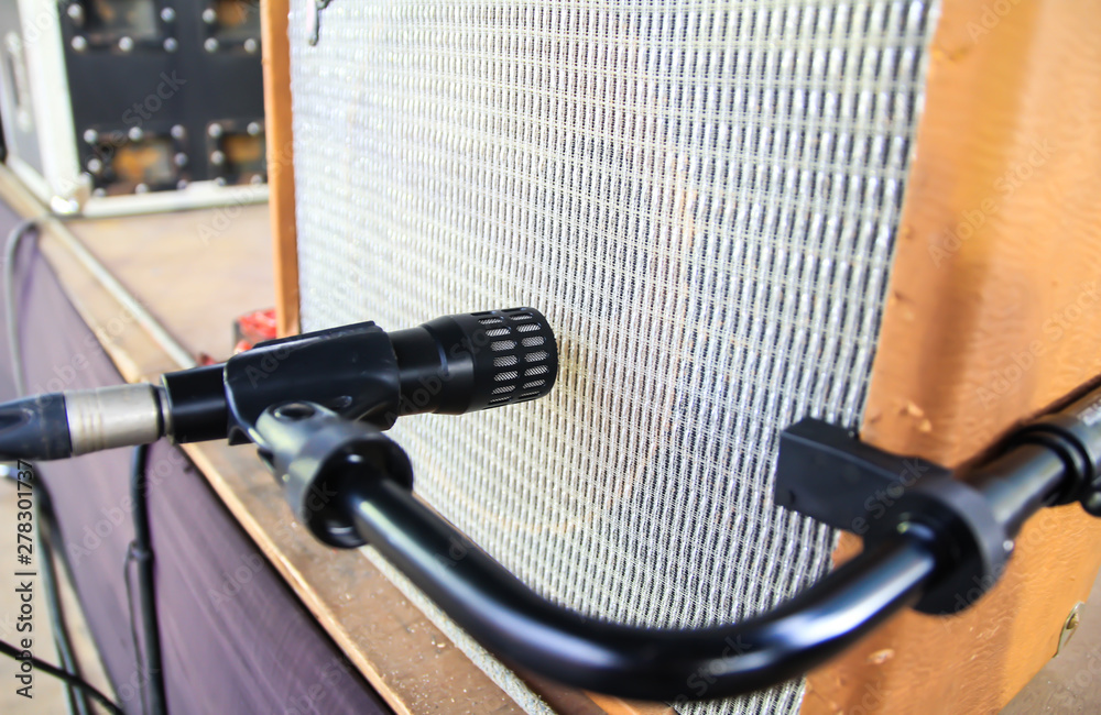 Microphone near guitar amplifier