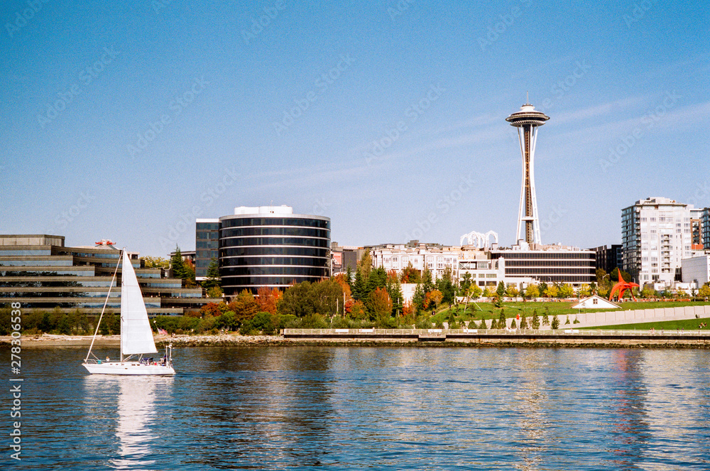 Sailboat in front of the city