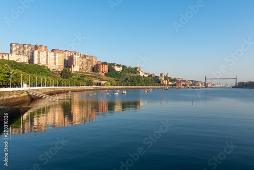 Panorama of Portugalete and Getxo with Hanging Bridge of Bizkaia from La Benedicta pier, Basque Country, Spain photo
