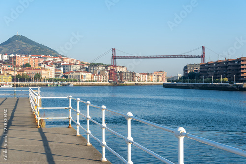 Panorama of Portugalete and Getxo with Hanging Bridge of Bizkaia from La Benedicta pier, Basque Country, Spain photo