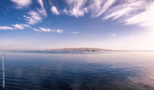 The panoramic view of an island from a dive boat moored at Abu Nuhas in the Red Sea, Egypt photo