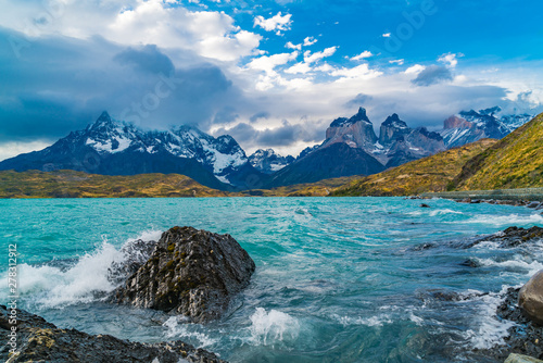 Beautiful scenic landscape at Lake Pehoe and Cuernos del Paine Mountains photo
