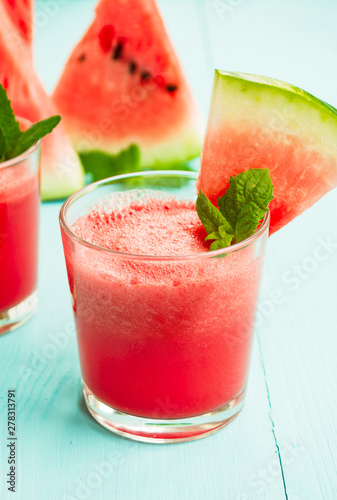 Watermelon drink and mint in a glass. A refreshing summer cocktail.