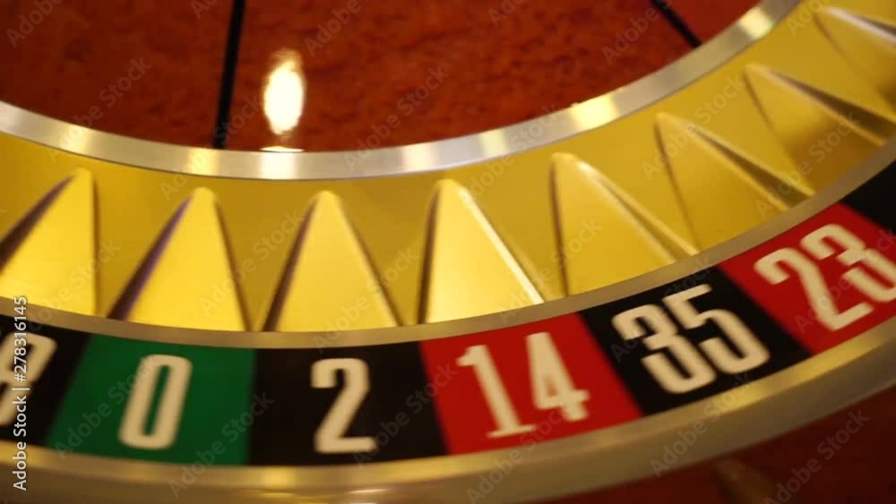 Spinning roulette wheel in casino, slow motion Spinning roulette wheel in casino, slow motion