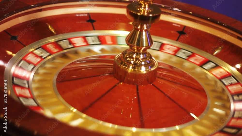 Close up, slow motion roulette wheel Close up, slow motion roulette wheel