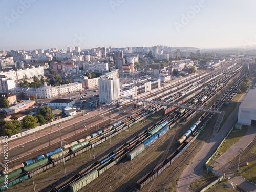 Cargo trains. Aerial view from drone freight wagon on the railway station. Railroad. Heavy industry. Top view