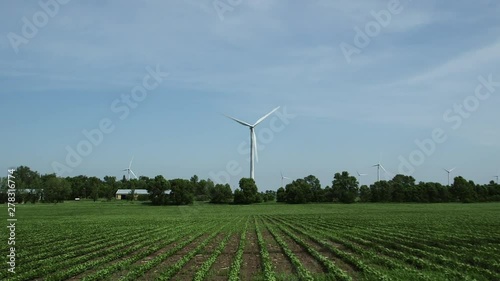 Wide, wind farm in rural landscape