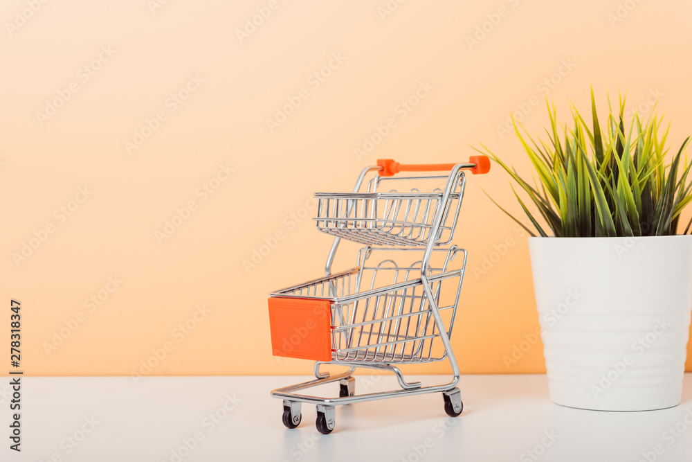 Mock up shoppong online cart on desk table office
