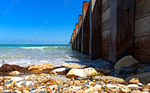 wooden breakwater in the sea