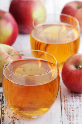 Two glasses with apple juice
