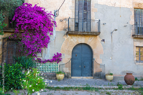 Typical Masia, rural construction, facade view exterior. Catalonia, Spain.
