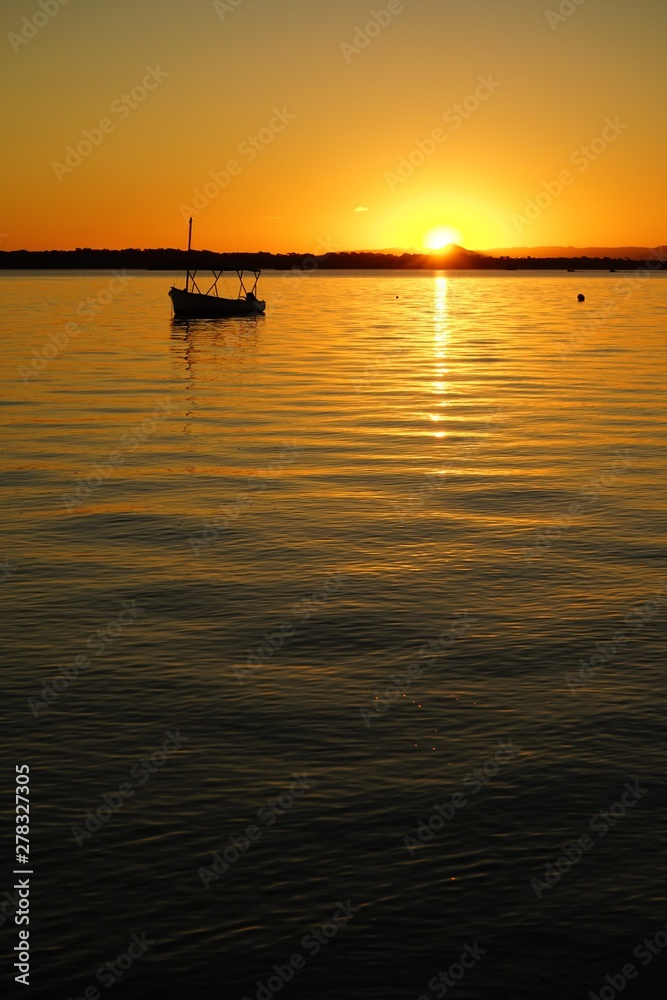 sunset over still water sunset over still water