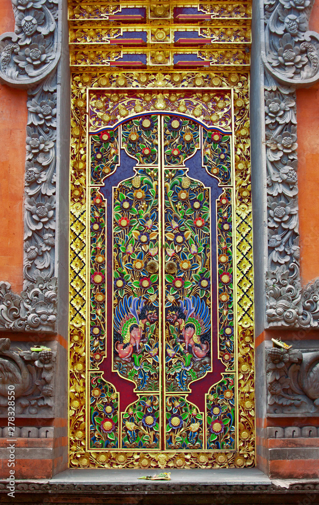 wood and stone decorative door with traditional asian patterns