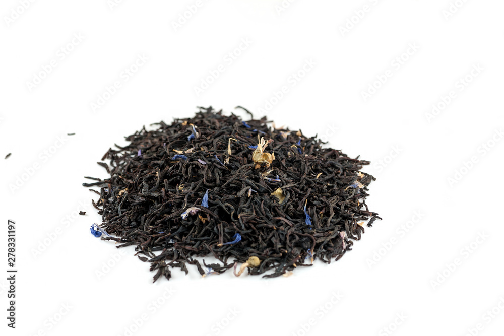 Dry black tea with blue flowers leaves isolated on white Dry black tea with blue flowers leaves isolated on white