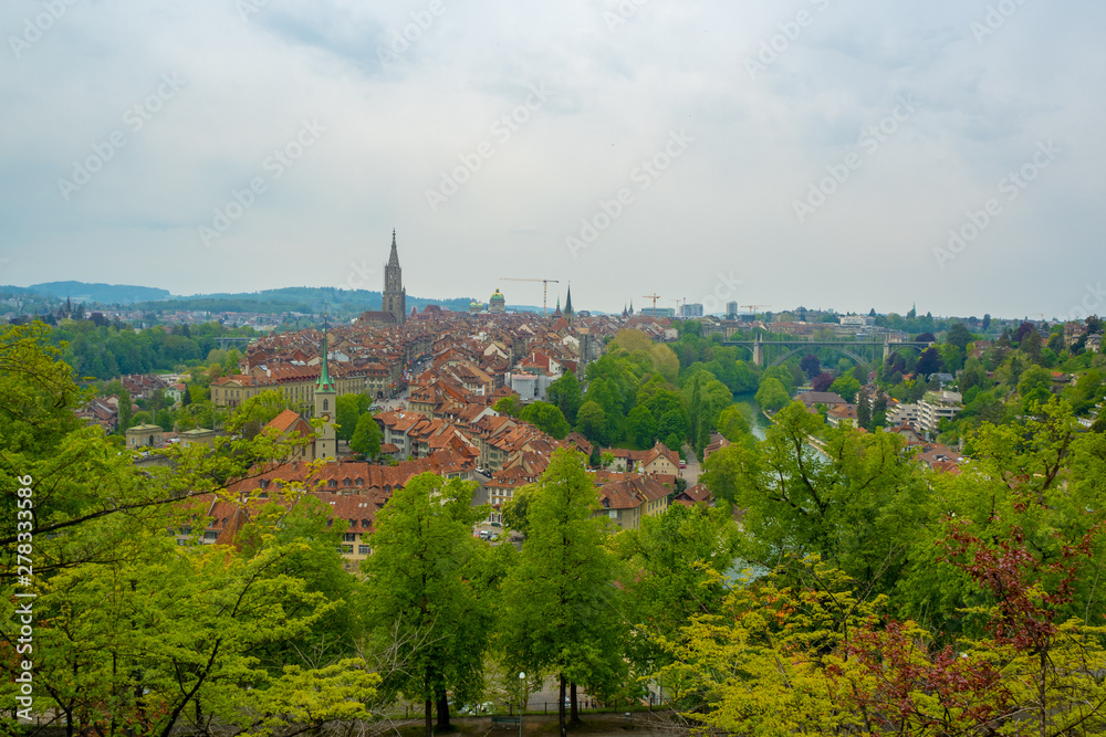Beautiful aerial panorama view of heritage city center of Bern on cloudy sky background with copy space, Switzerland