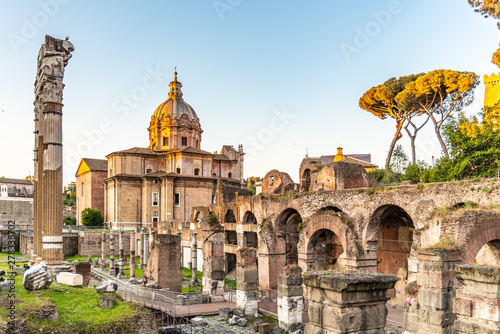 Roman Forum with Church of Santi Luca e Martina on sunny summer morning. Antique ruins in Rome, Italy