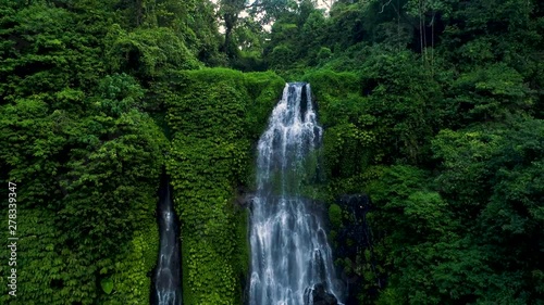 Amazing Tropical Waterfall in Green Rainforest. photo