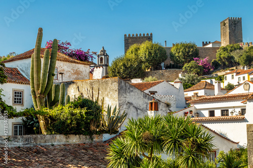 View of Obidos, Portugal. A small town surrounded by medieval castle walls. Popular touristic destination near Lisbon. photo