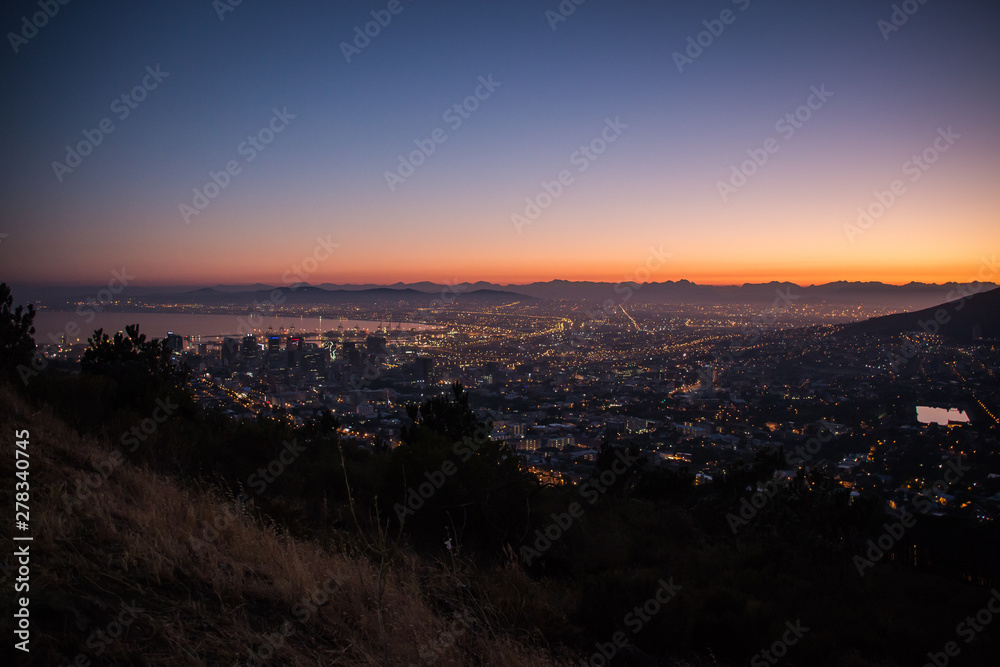 Sunrise On Lion's Head and Signal Hill Looking over Cape Town City In The Early Morning in South Africa Sunrise On Lion's Head and Signal Hill Looking over Cape Town City In The Early Morning in South Africa