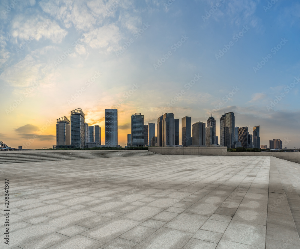 empty square and city skyline at dusk, tianjin city, china.