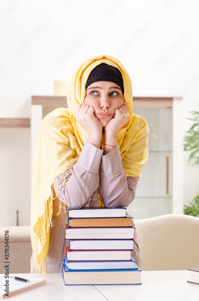 Female student in hijab preparing for exams Female student in hijab preparing for exams
