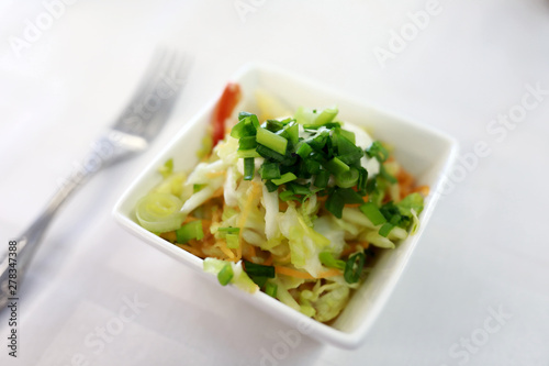 Vegetable salad with green onions