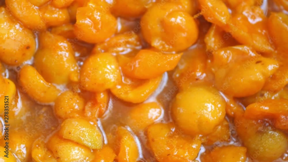 Cooking delicious apetitous apricot jam, Fruit orange jam. 4K video Cooking delicious apetitous apricot jam, Fruit orange jam. 4K video