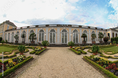 Old castle with beautiful park in front of it photo