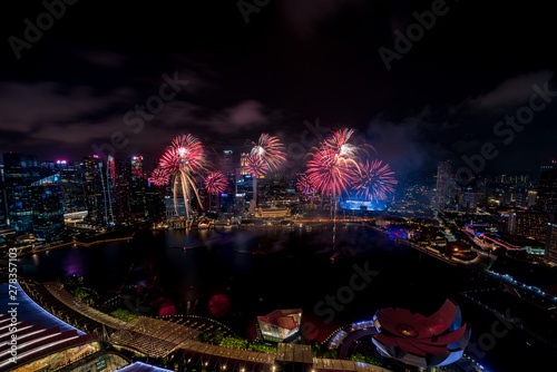 Aerial view of Singapore national day fireworks celebration at Marina Bay cityscape
