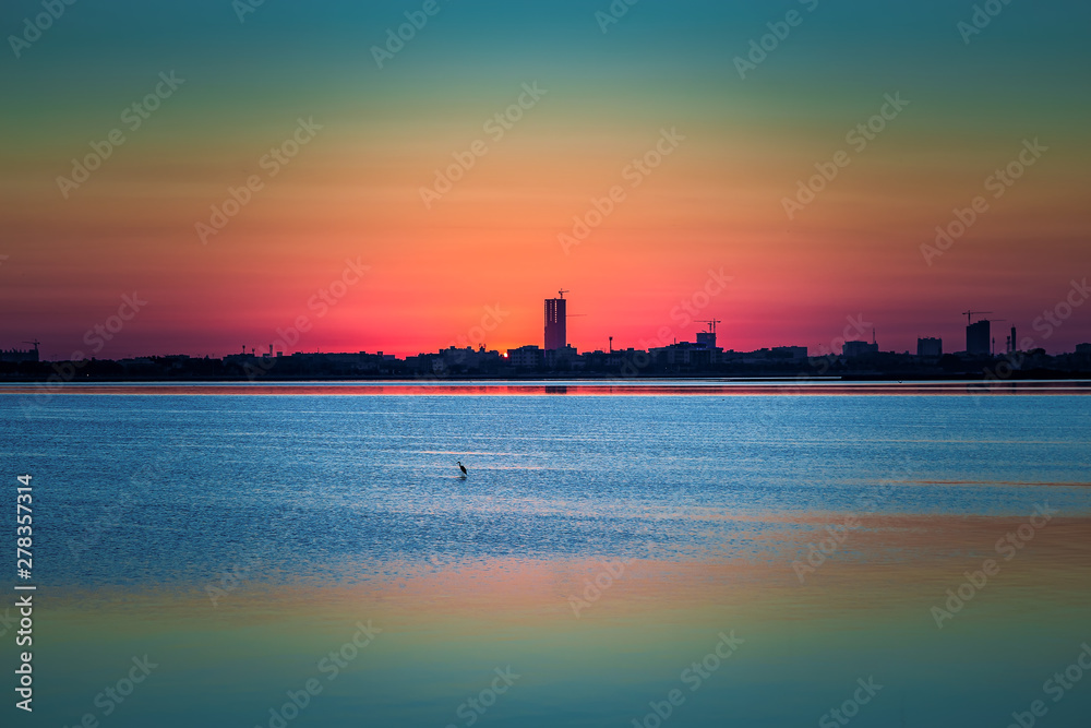 Beautiful Sunrise in seaside with red and dark sky. Dammam -Saudi Arabia