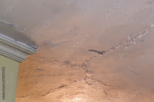 Water dripping from leaking ceiling