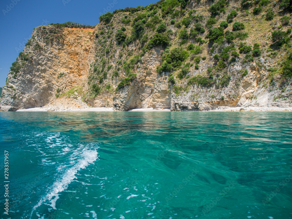 Rocky shores and blue Adriatic sea near the town of Budva, Montenegro