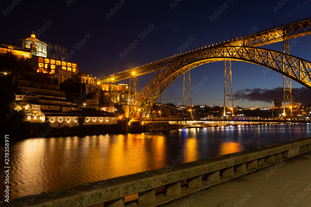 D. Luis I bridge illuminated at night. Douro river. Porto city